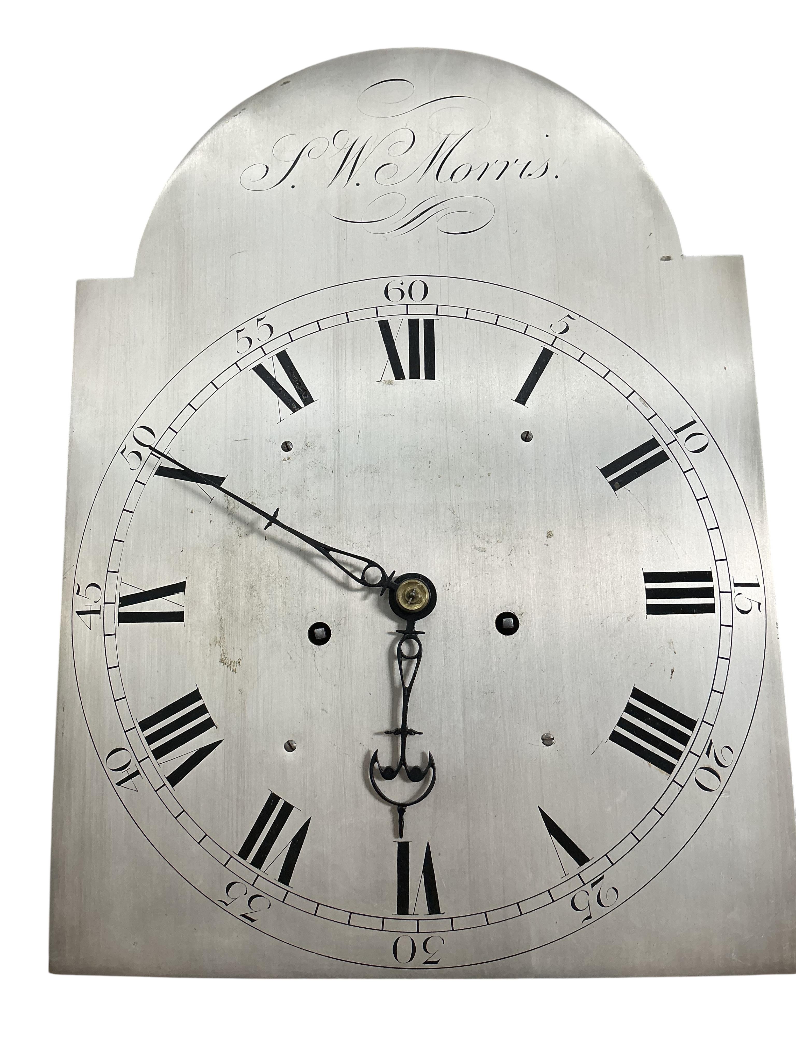 A George III inlaid mahogany eight day longcase clock, the silvered dial marked J.W. Morris, height 218cm